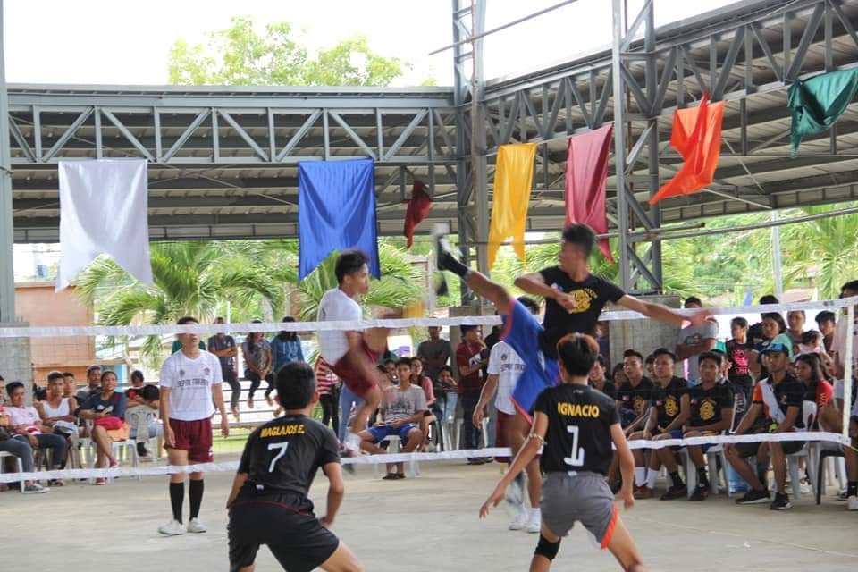 student playing sepak takraw